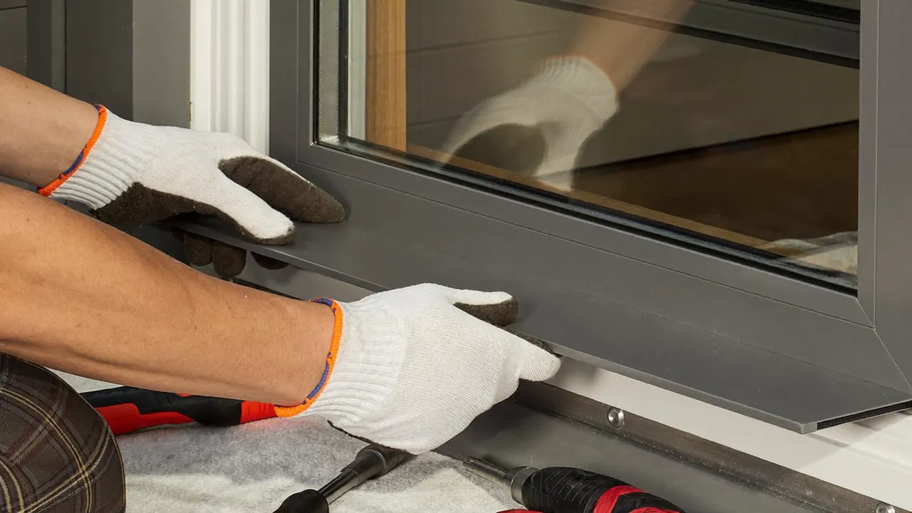 An unfinished window installation with poorly sealed edges